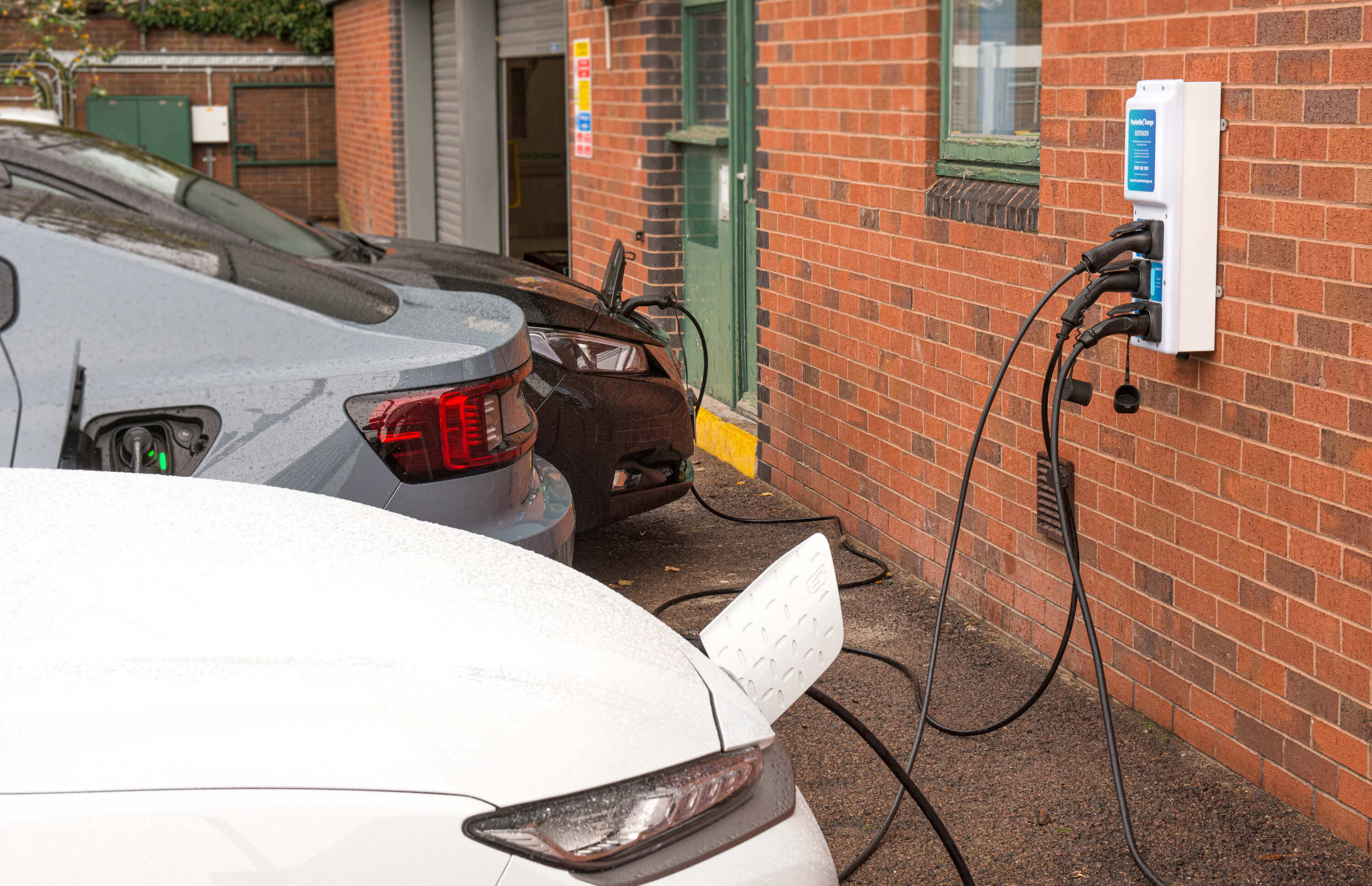 Three Electric Cars charging from one Charger