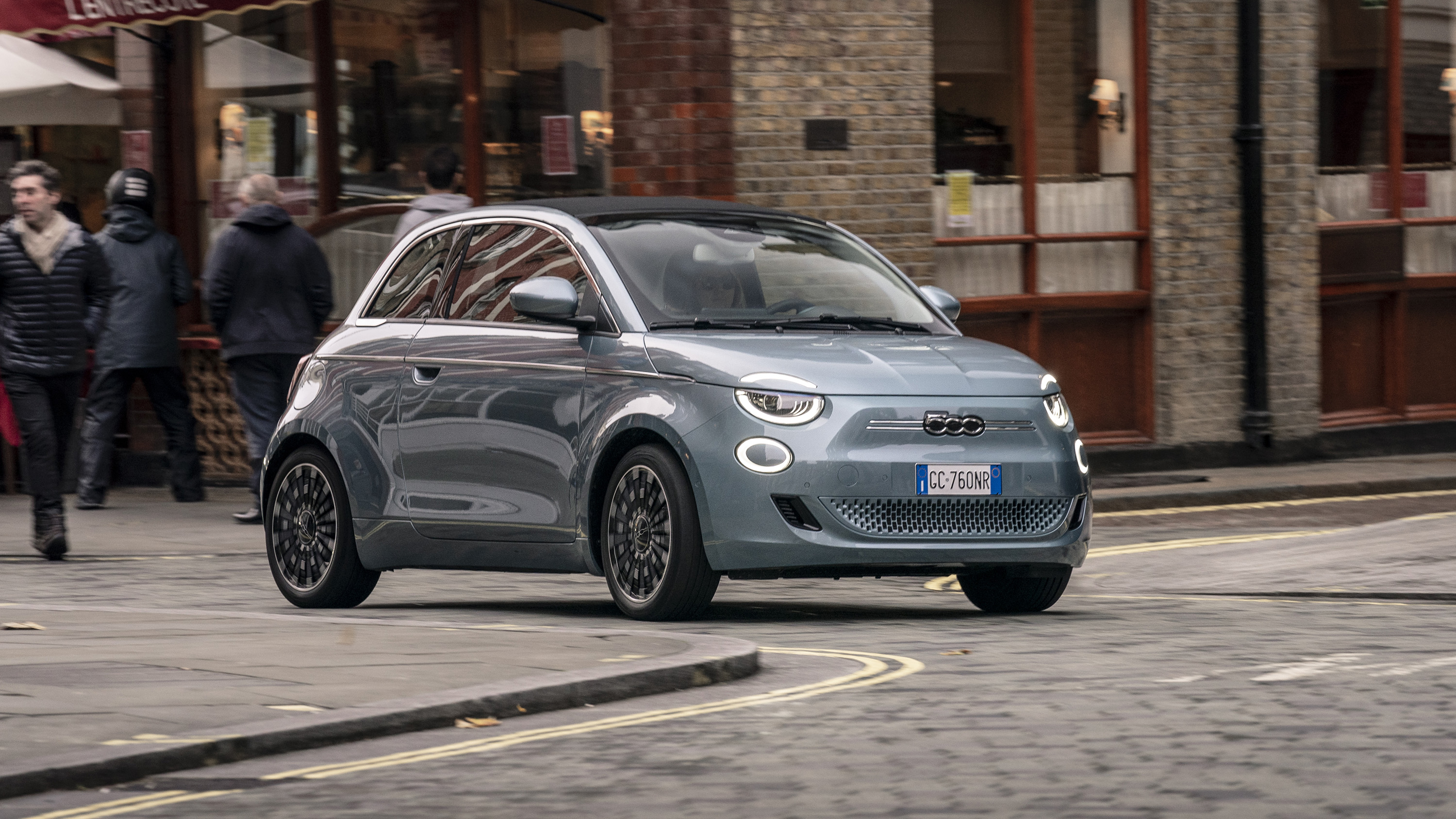 Fiat 500e Electric Car driving in the street